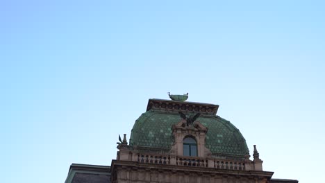 slow push in reveal of historical building in city center of vienna