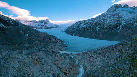 stunning cinematic aerial shot of rhone glacier, switzerland