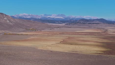 october fall autumn lake crowley highway road to mammoth lakes mountain california aerial drone minarets morning blue sky bishop toms place sierra mountains whitmore hilltop hotsprings forward motion