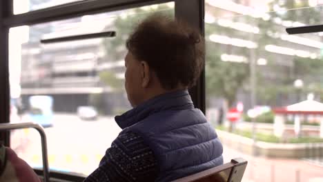 elderly man on a tram