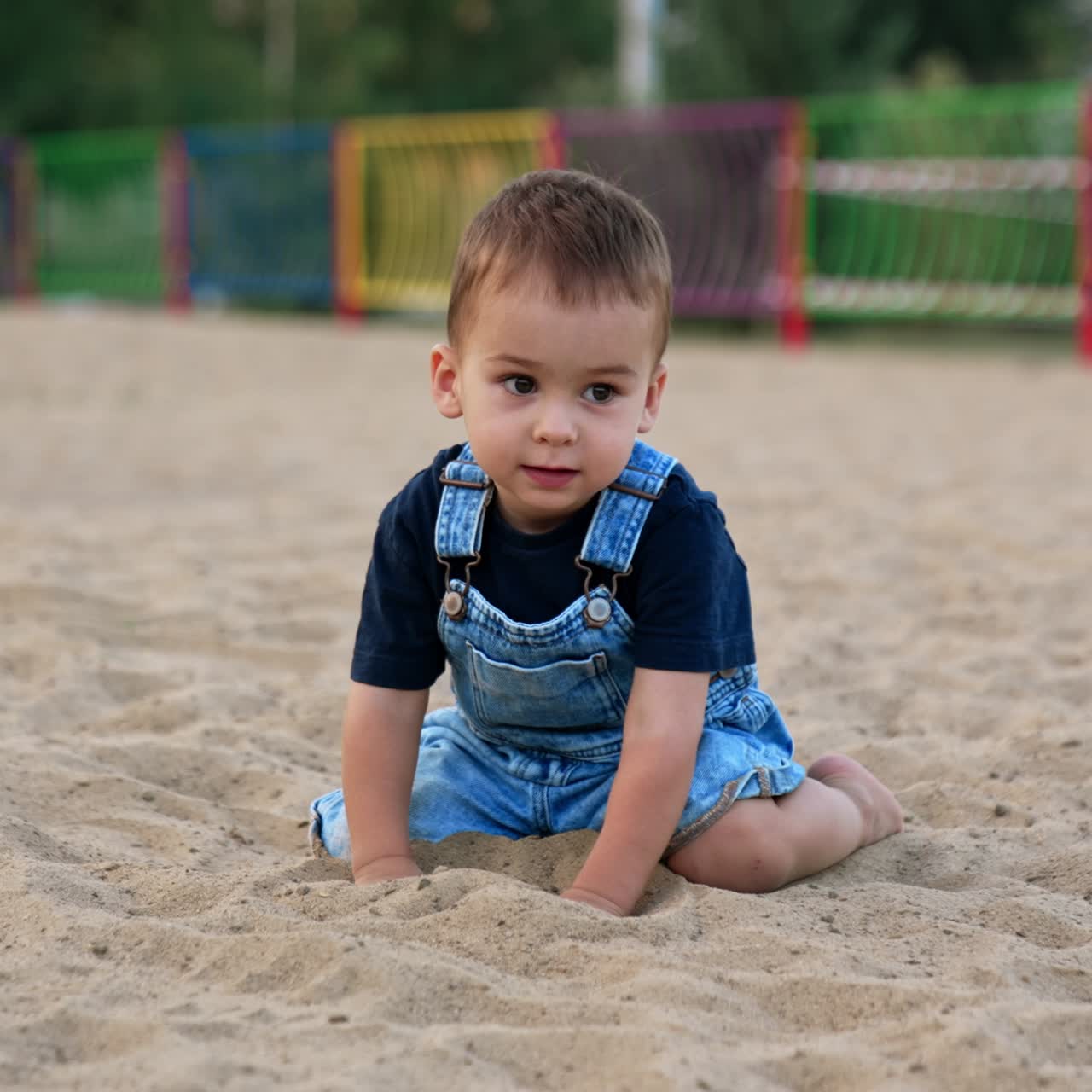 Little child summer lifestyle. Small boy on playground having fun