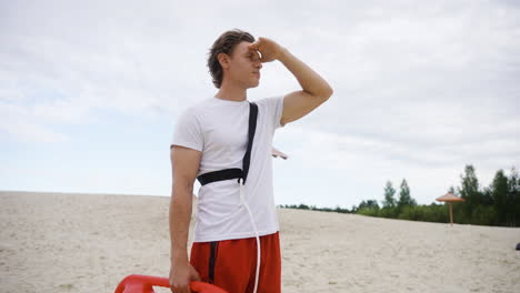 male lifeguard at the beach