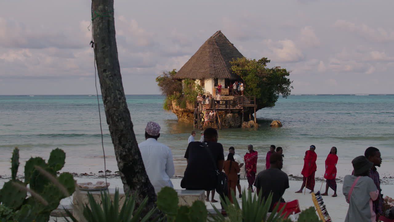 View of the Rock restaurant during high tide, on a small remote island. Tanzania, Zanzibar.