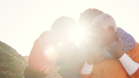 portrait of smiling senior friends having fun walking in countryside together