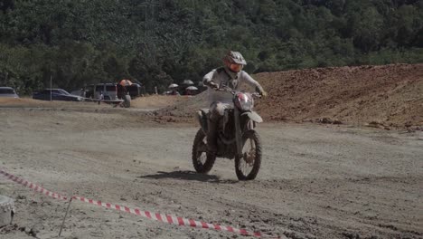 motocross rider on a dirt bike track