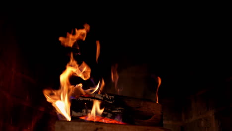 fire burning in fireplace. close up of warm cozy fire in fireplace