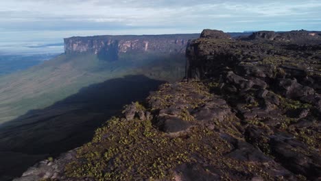 aerial top down view of roraima and kukenan tepui summit under sunlight