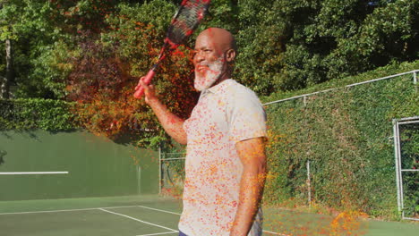 senior man tossing colored powder on tennis court, with animated fitness chart floating above