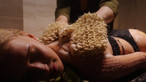 woman receiving hammam massage