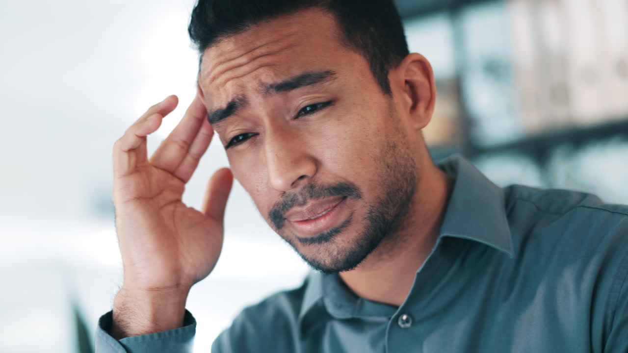 Headache, business man and pain at office