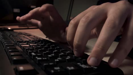 person typing on a keyboard