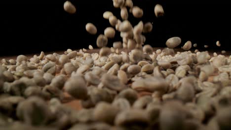 peanuts falling down on a table