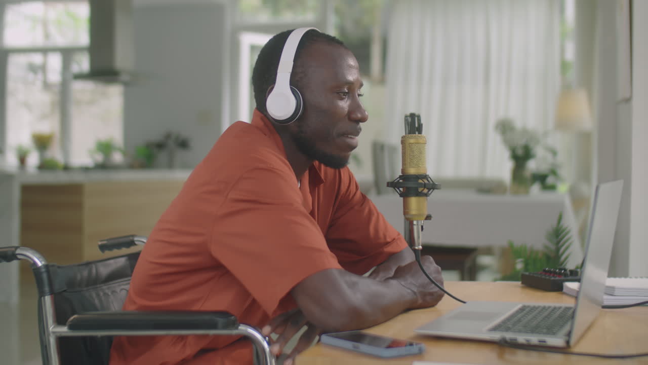 Black Man with Disability Recording Podcast at Home