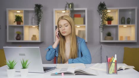 female student chatting with her boyfriend on the phone.