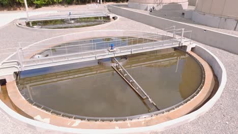 circular pond at wastewater treatment plant