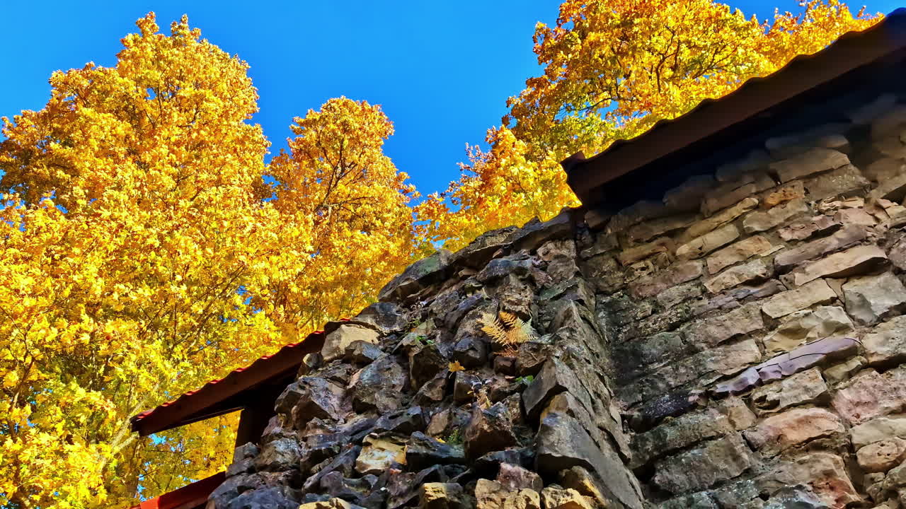 Autumn sunlight on stone structure in Lielvārdes, Latvia