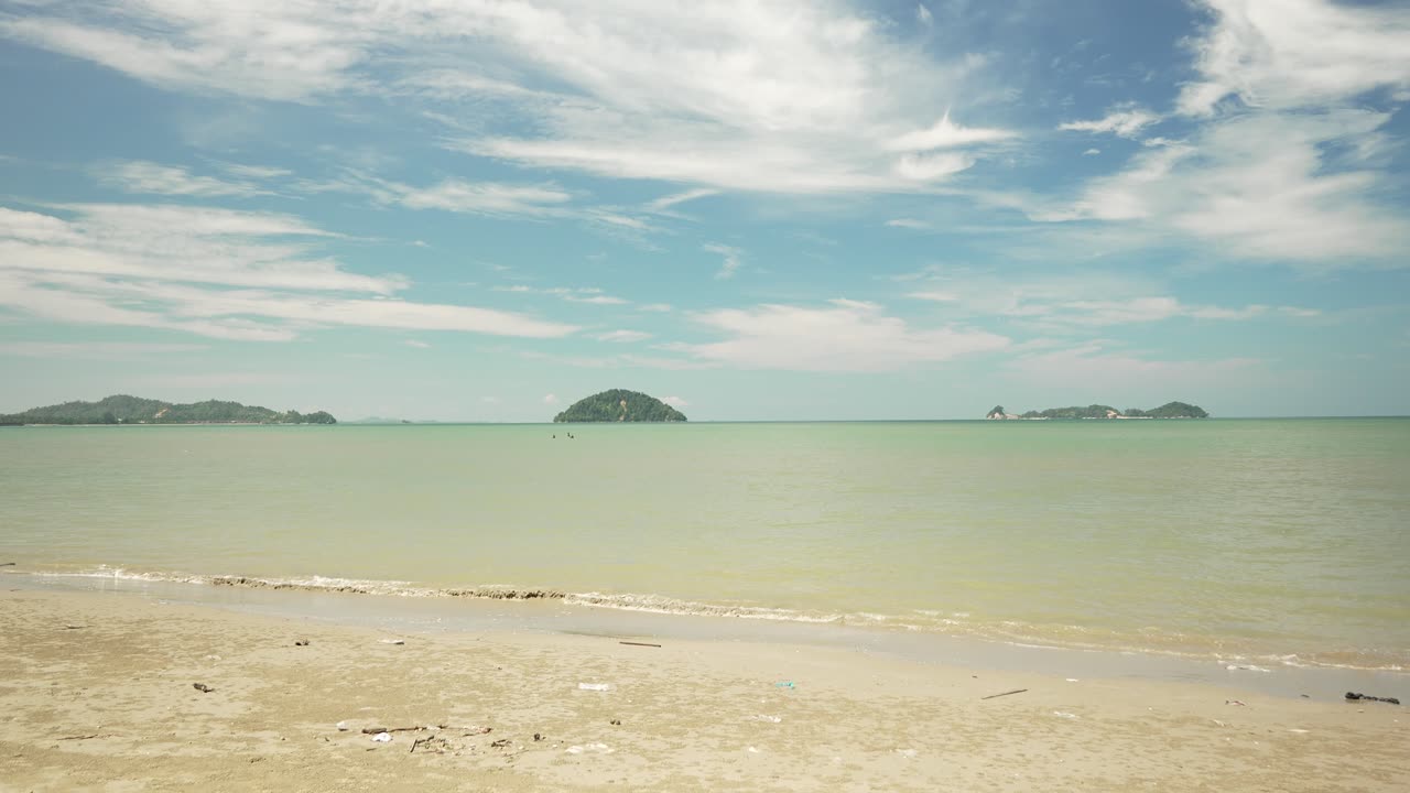 Lok Kawi Beach The Beach Sits Near Residentail Zone,With Its Shoreline Sea,Beds,Good For Casual Beach Time,During Sunset,With White Sandy Beach,Blue Sea Facing Few Island To The South China Sea