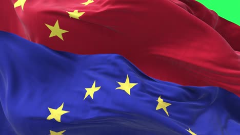 las banderas de la unión europea y china ondeando con un fondo de pantalla verde