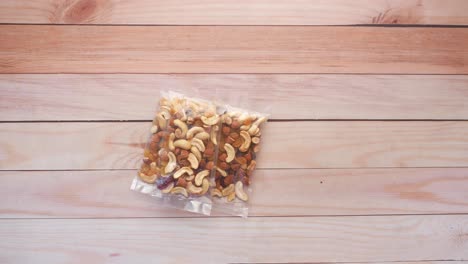 mixed nuts and raisins in plastic bags