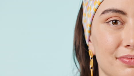 Half-face,-space-and-smile-with-a-woman-closeup