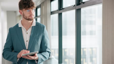 man using tablet in office