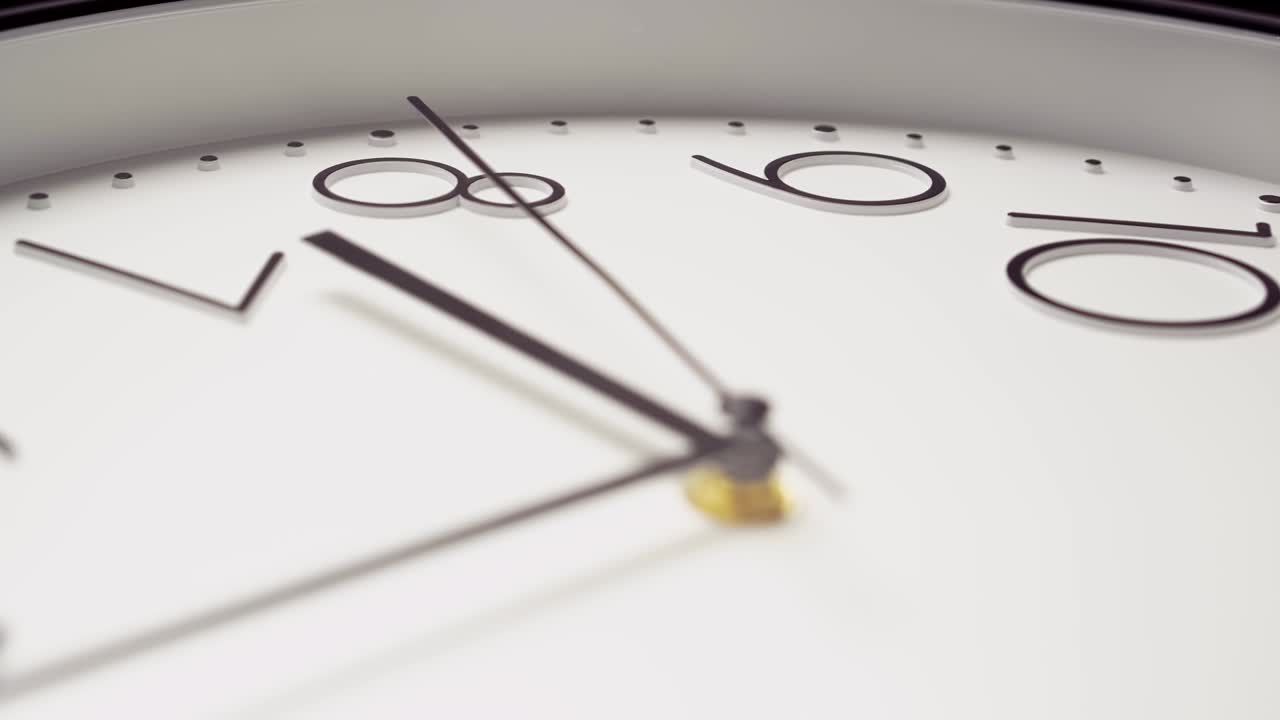 White wall clock, close-up, fast movement. The camera follows the second hand. Time concept.