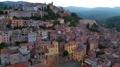 Aerial-view-of-Cori,-a-city-in-the-province-of-Latina,-in-the-Lazio-region-of-central-Italy-starting-from-a-close-view-on-the-temple-of-Dioscuri,-castor-and-pollux