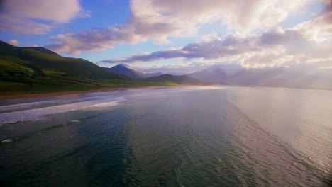beautiful sea and green hills during sunset 4k