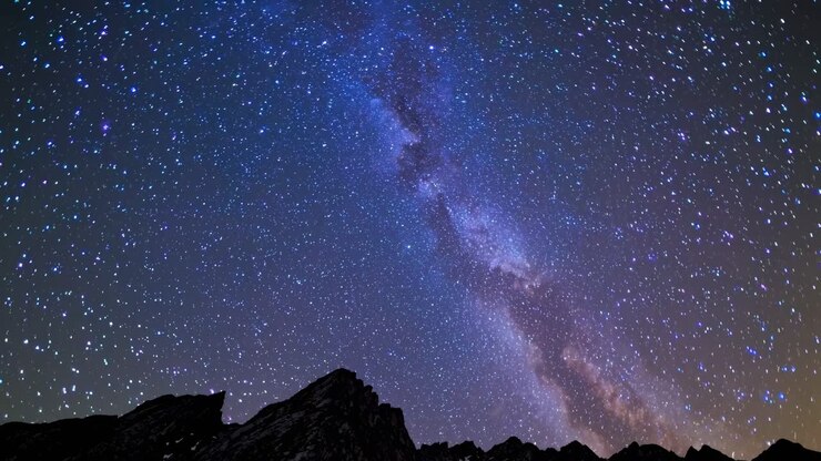 A mesmerizing night sky video with a low-angle view, capturing the Milky Way&#039;s brilliance