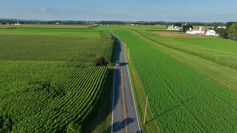 tracking shot of truck driving in rural usa