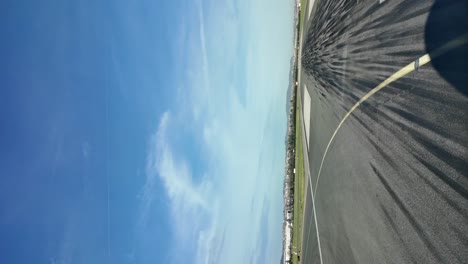 shadow of a jet airplane leaving the runway after landing