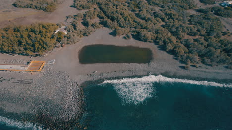 Aerial-view-of-the-puddle-of-the-Village-of-San-Nicolas-on-a-sunny-day