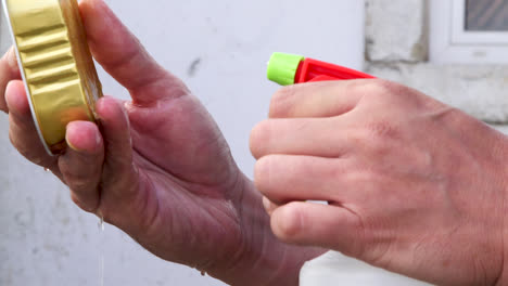 Cleaning-and-disinfecting-groceries-during-the-COVID-19-pandemic,-detail-shot