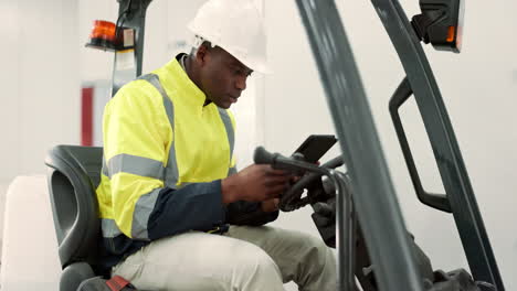 Tablet,-forklift-and-engineering-with-black-man