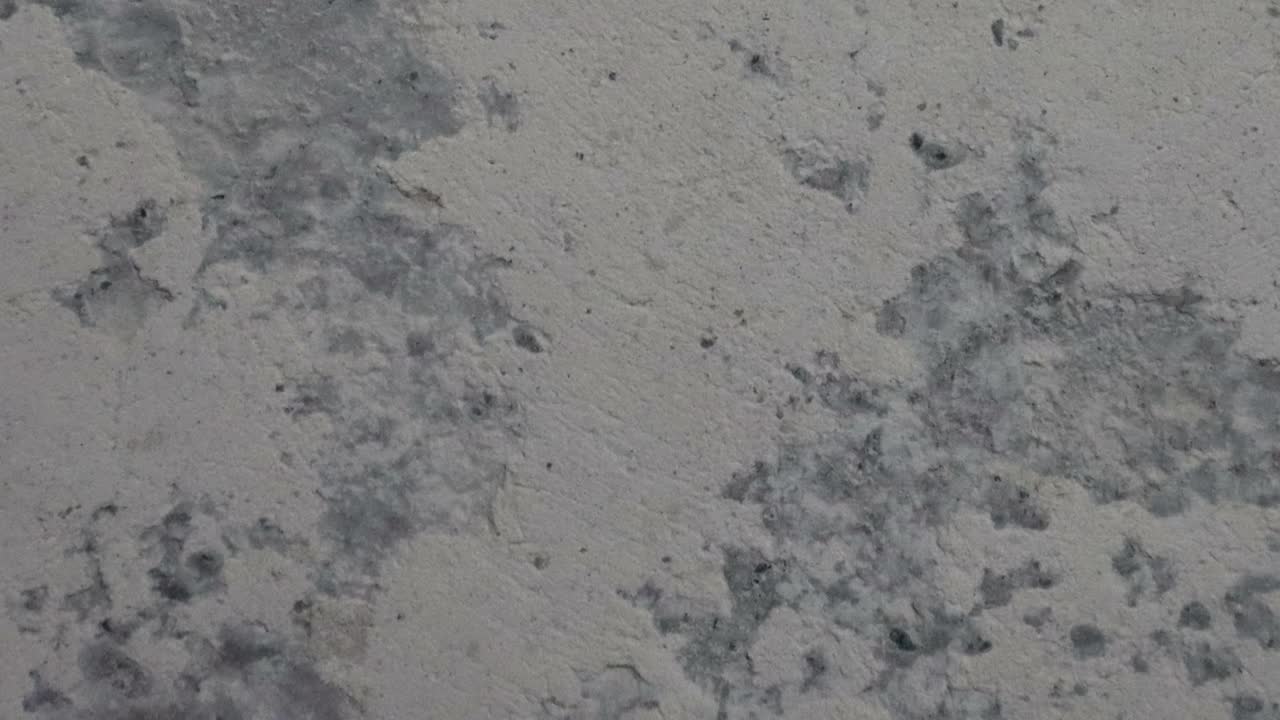 stop motion animación de fondo de textura de hormigón o útil para viejos efectos de películas utilizando la herramienta de opacidad o luma mate