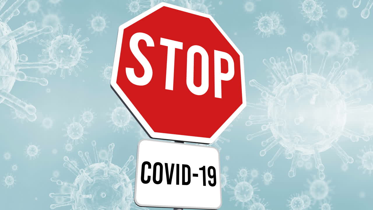 Animazione di un segnale di stop sopra cellule del virus COVID-19