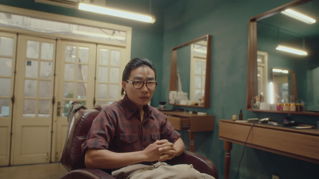 Serious Asian Barber in the Barbershop