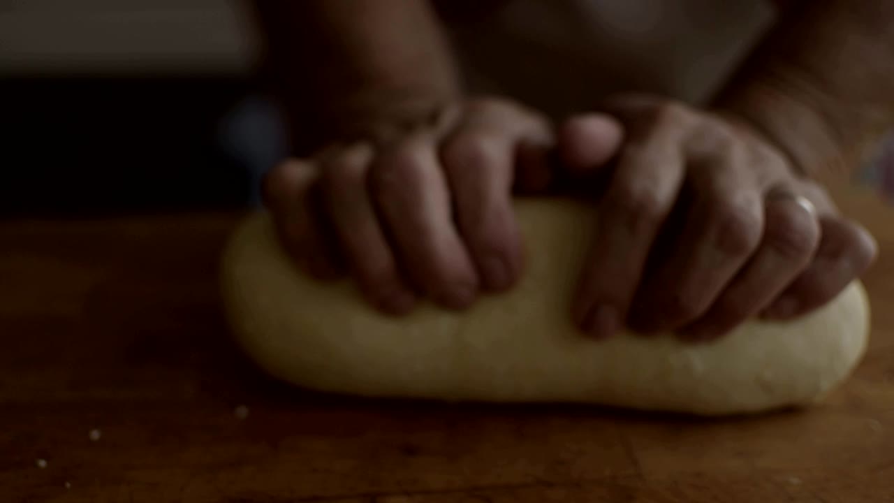Italian woman making pasta with her hands