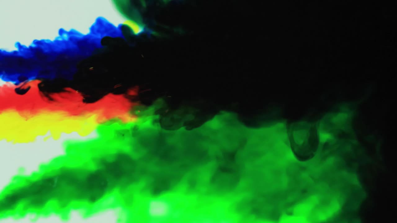 Ink cloud overlay. Color blast. blue , red, yellow smoke motion on white background for video editing.