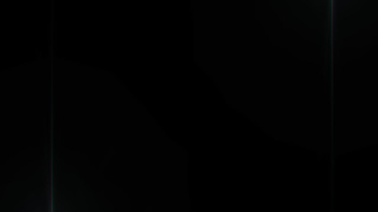 Tunnel of distorted hexagon outlines moving with spotlights on black background