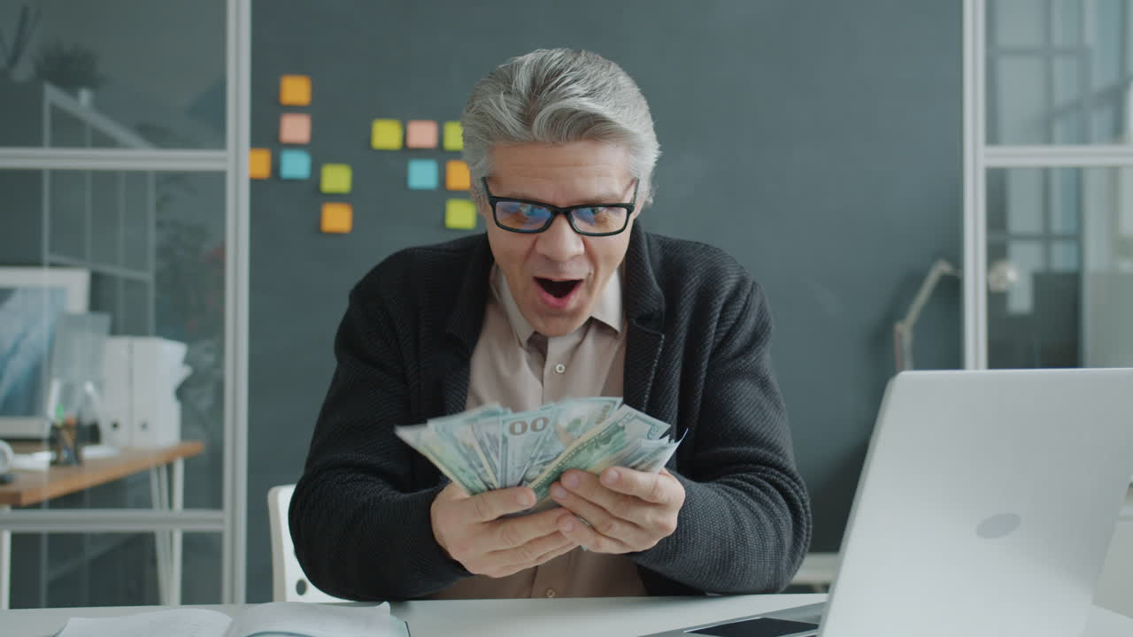 Happy Man Receiving Payment