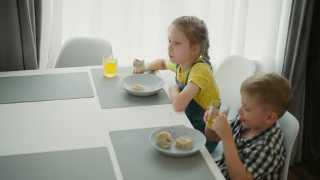 children eating dumplings