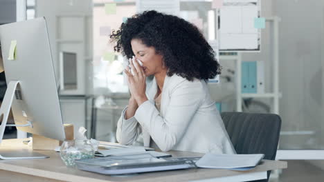 Sick-business-woman-looking-unwell-while-blowing