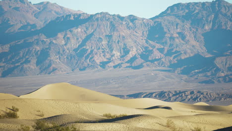 distant mountains seen from mesquite sand dunes