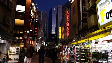 illuminated signs and busy urban nightlife activity