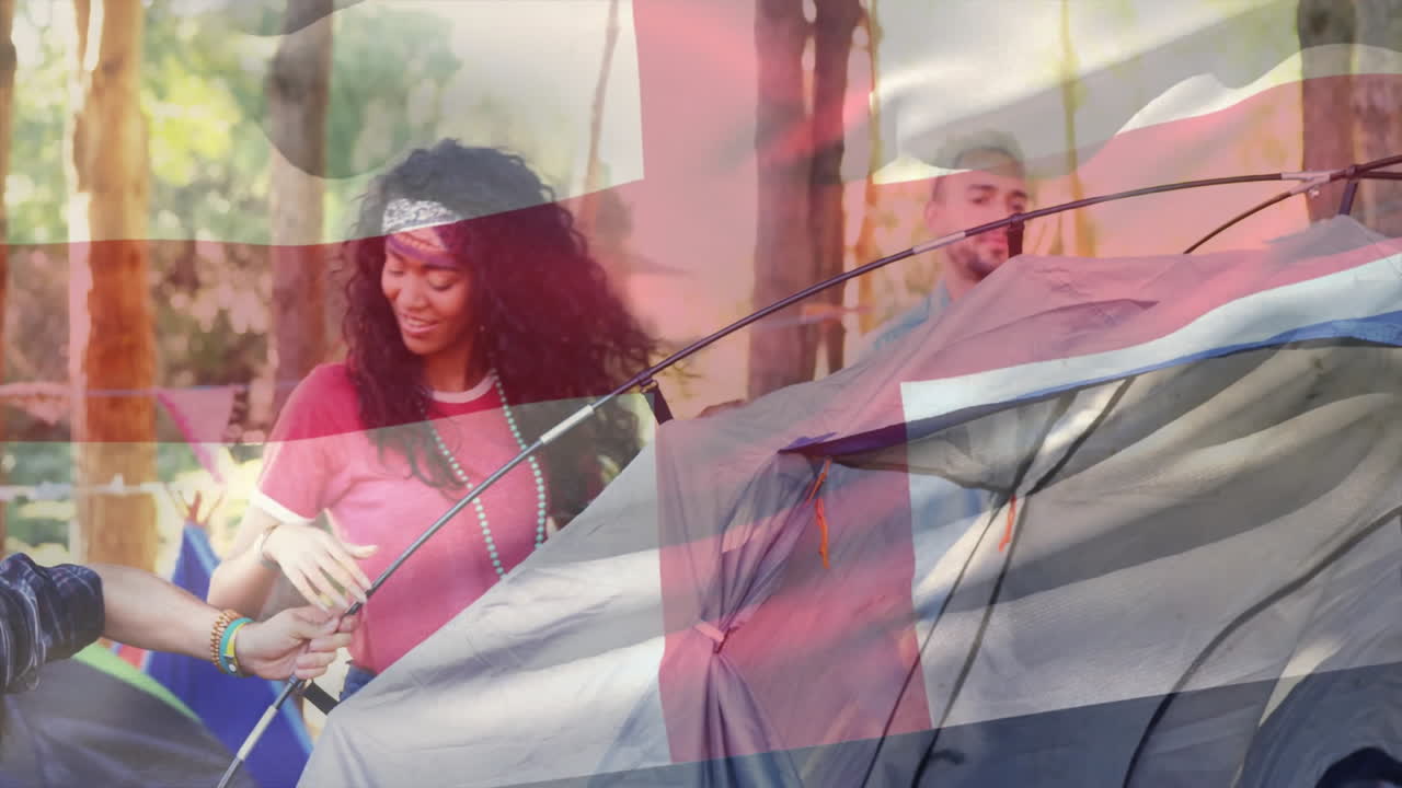 montando tiendas de campaña, la gente acampando sobre la bandera de inglaterra animación
