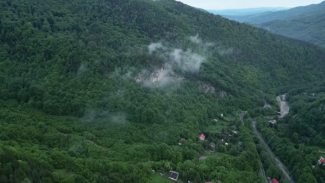 Foggy-Mountain-Range-In-Lepsa,-Vrancea,-Romania---Aerial-Drone-Shot