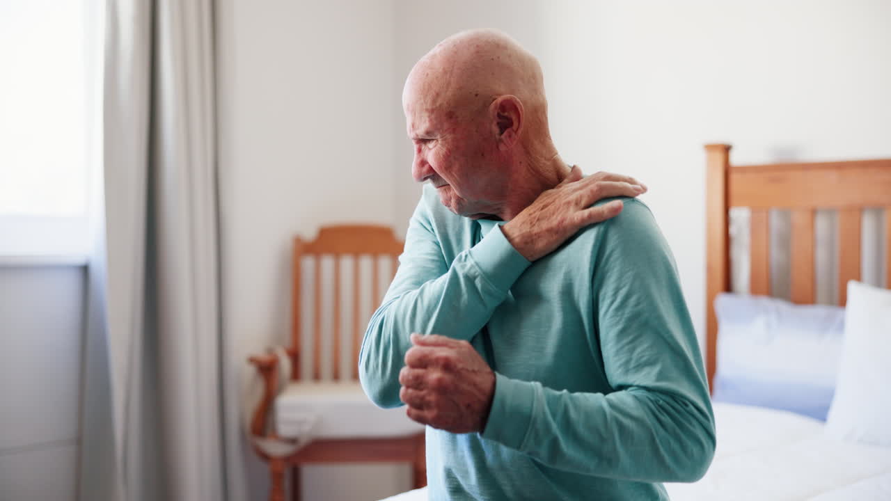 Senior man experiencing shoulder pain