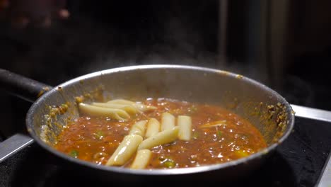 putting-the-pasta-in-boiled-vegetable-gravy