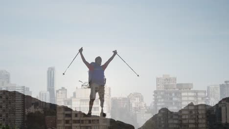 composite video of african american man hiking on the mountains against cityscape